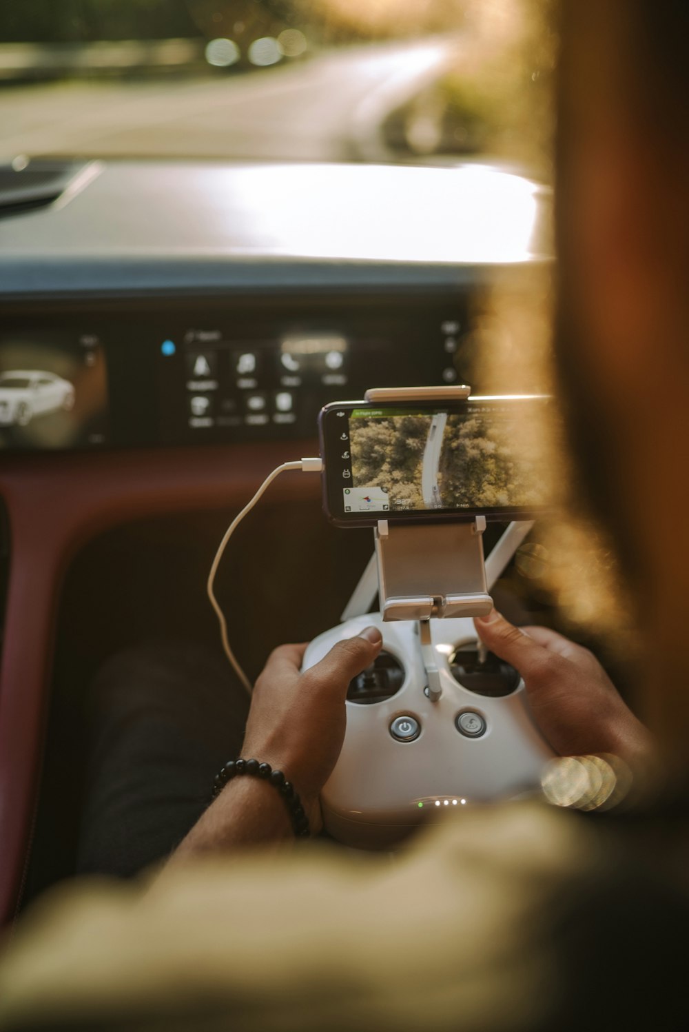 person holding white game controller