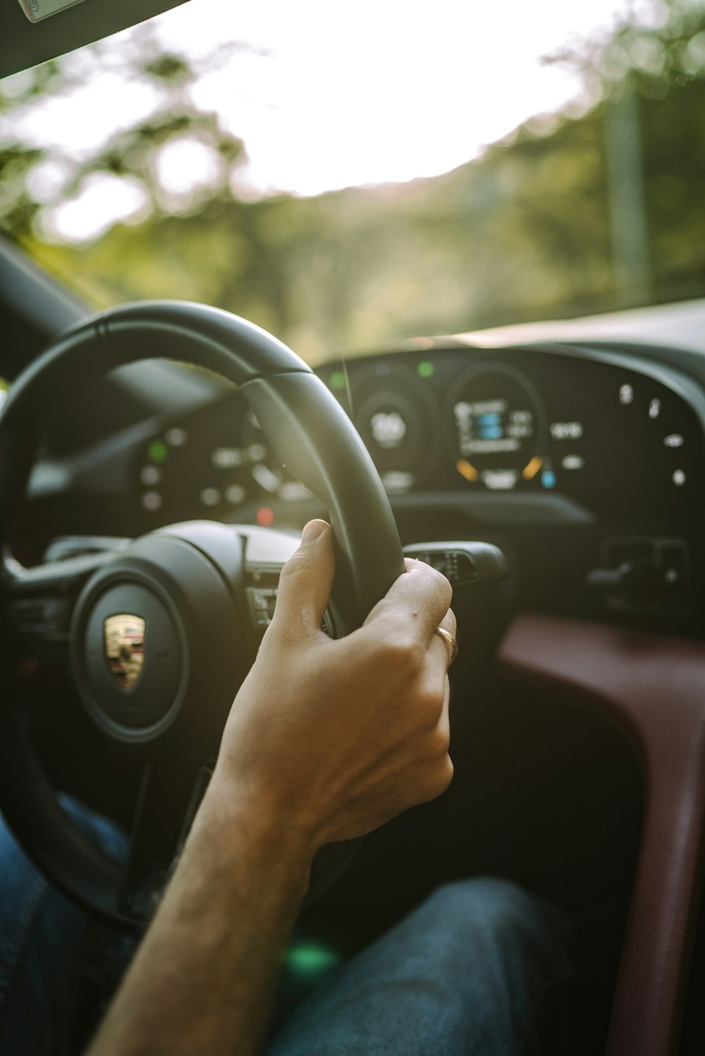 person driving car during daytime