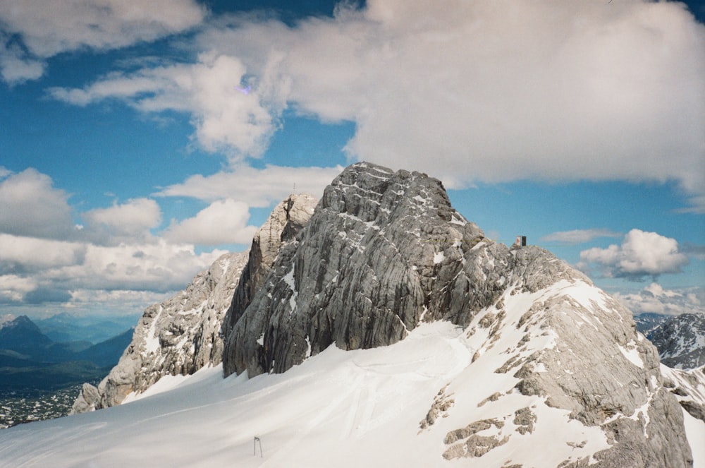 snow covered mountain under blue sky during daytime