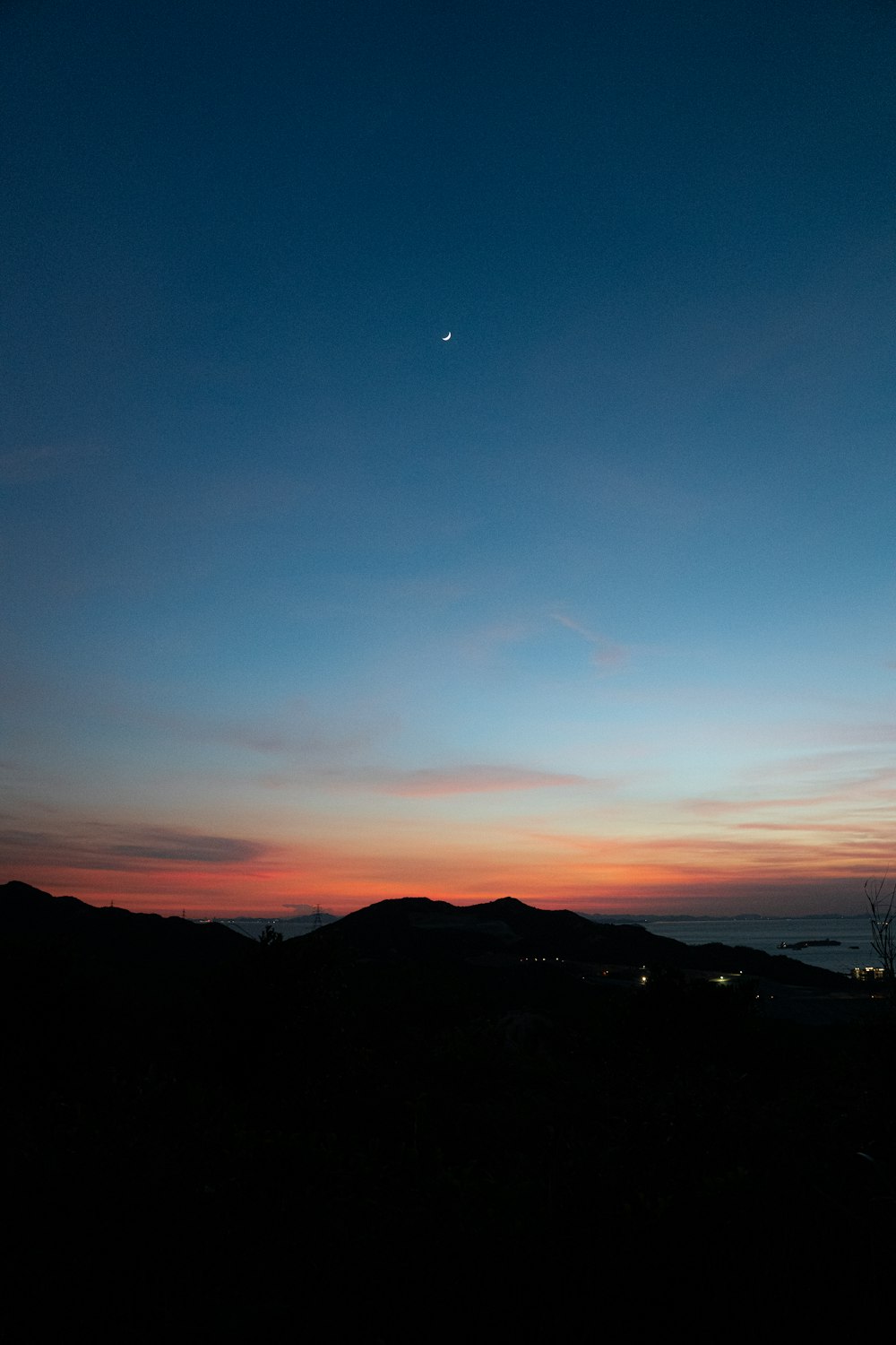 silhouette of mountain during sunset