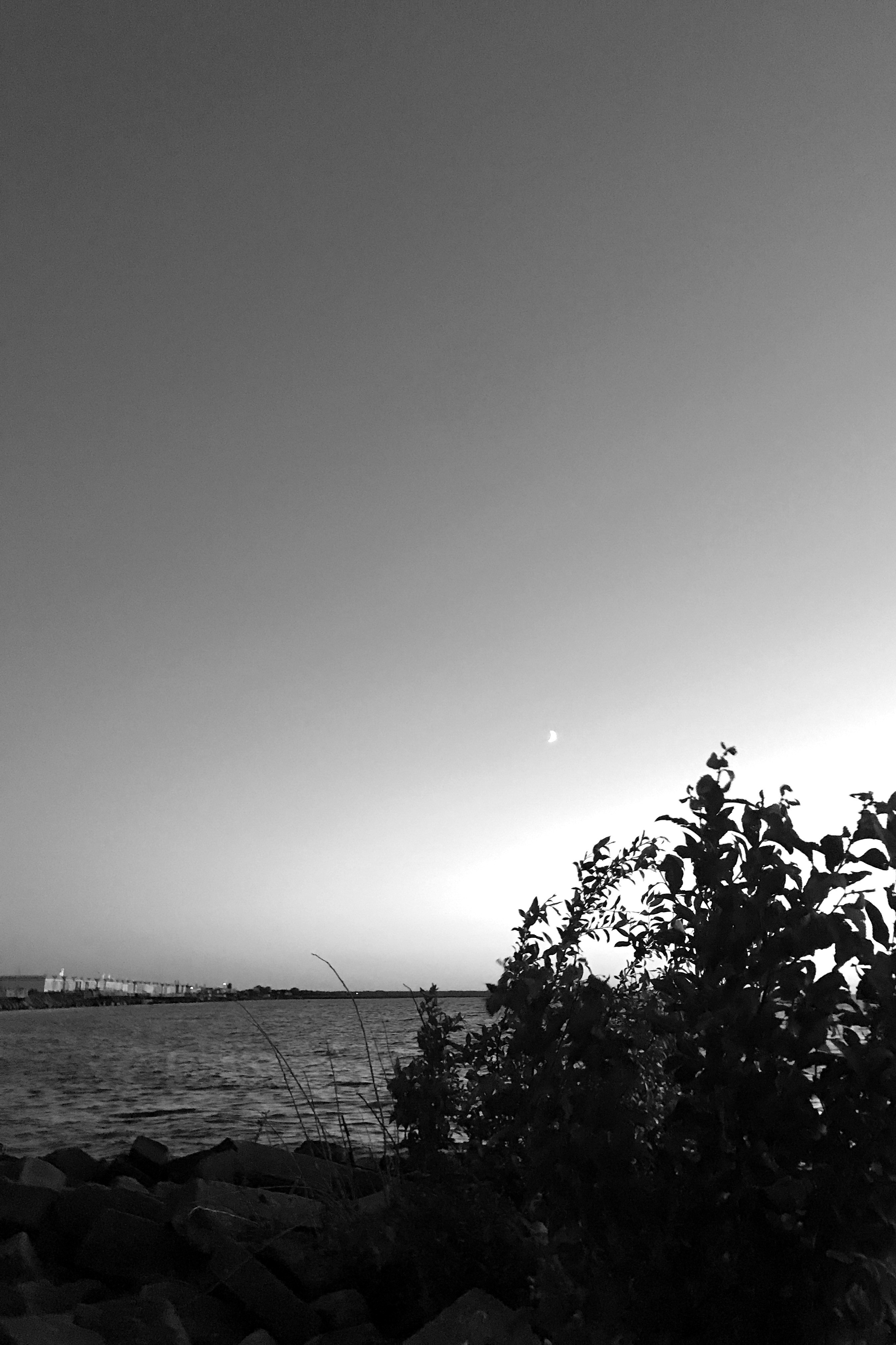 Ansel Adams' iconic black and white landscape photograph Moonrise, Hernandez captures the ethereal beauty of nature in stunning monochrome