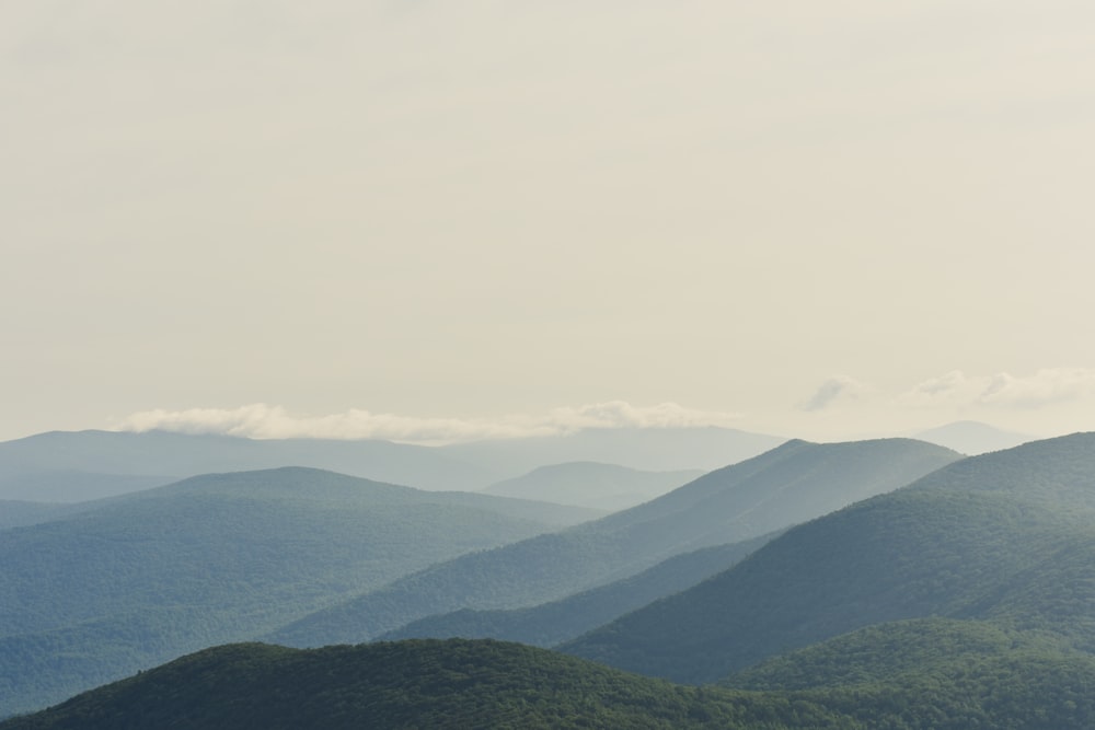 green mountains under white sky during daytime