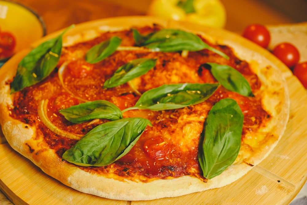 pizza with green leaf on yellow plate