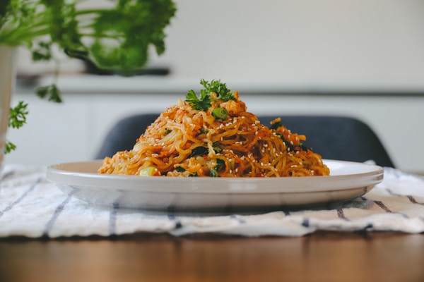 Pasta dish on white ceramic plate