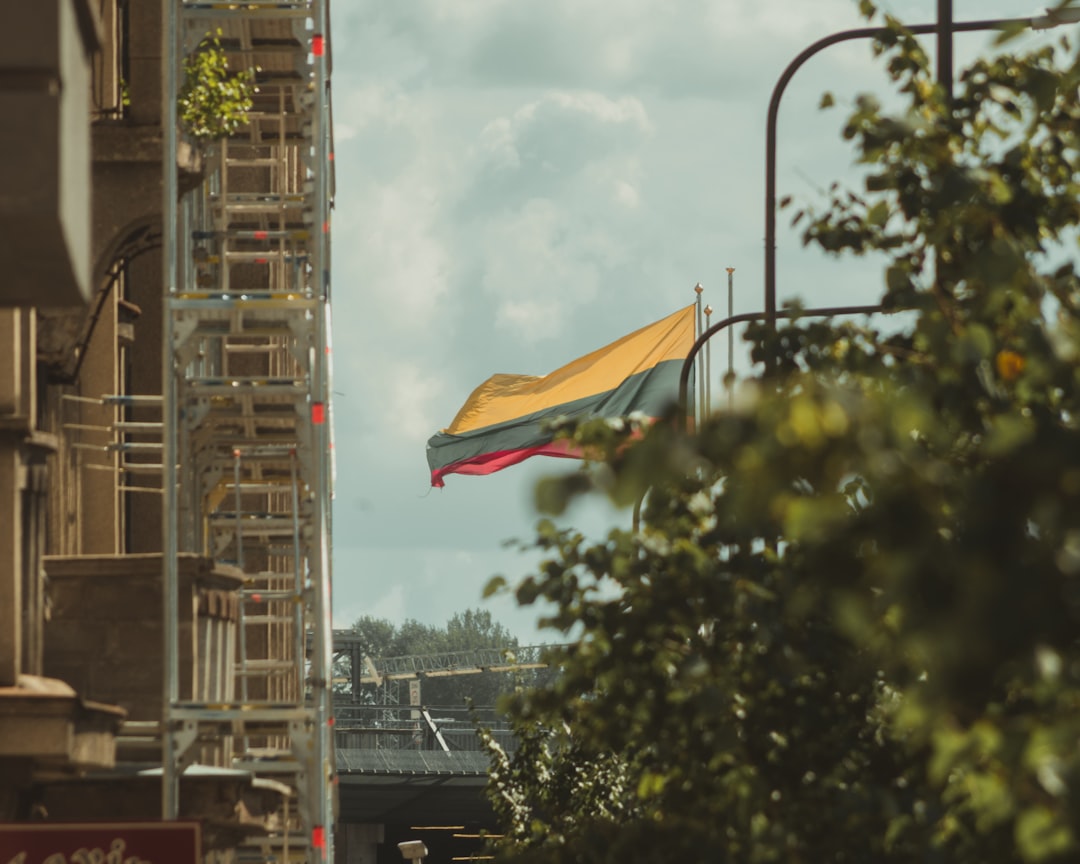 red yellow and blue flag on pole