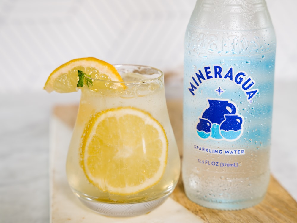 clear glass bottle with lemon juice