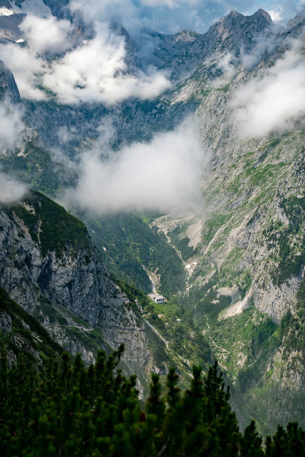 green and gray mountains under white clouds