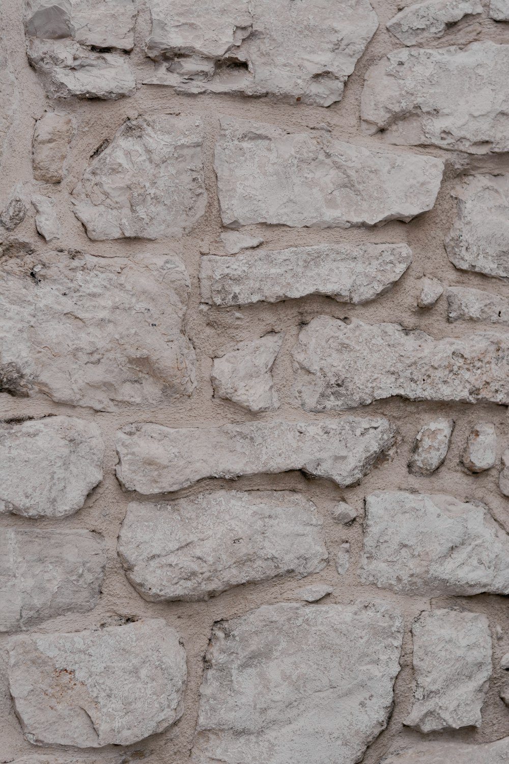 brown and gray brick wall