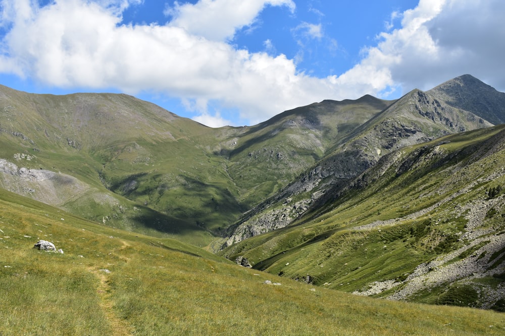 green mountains under blue sky during daytime