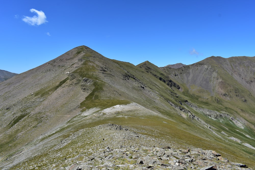 green and brown mountain under blue sky during daytime