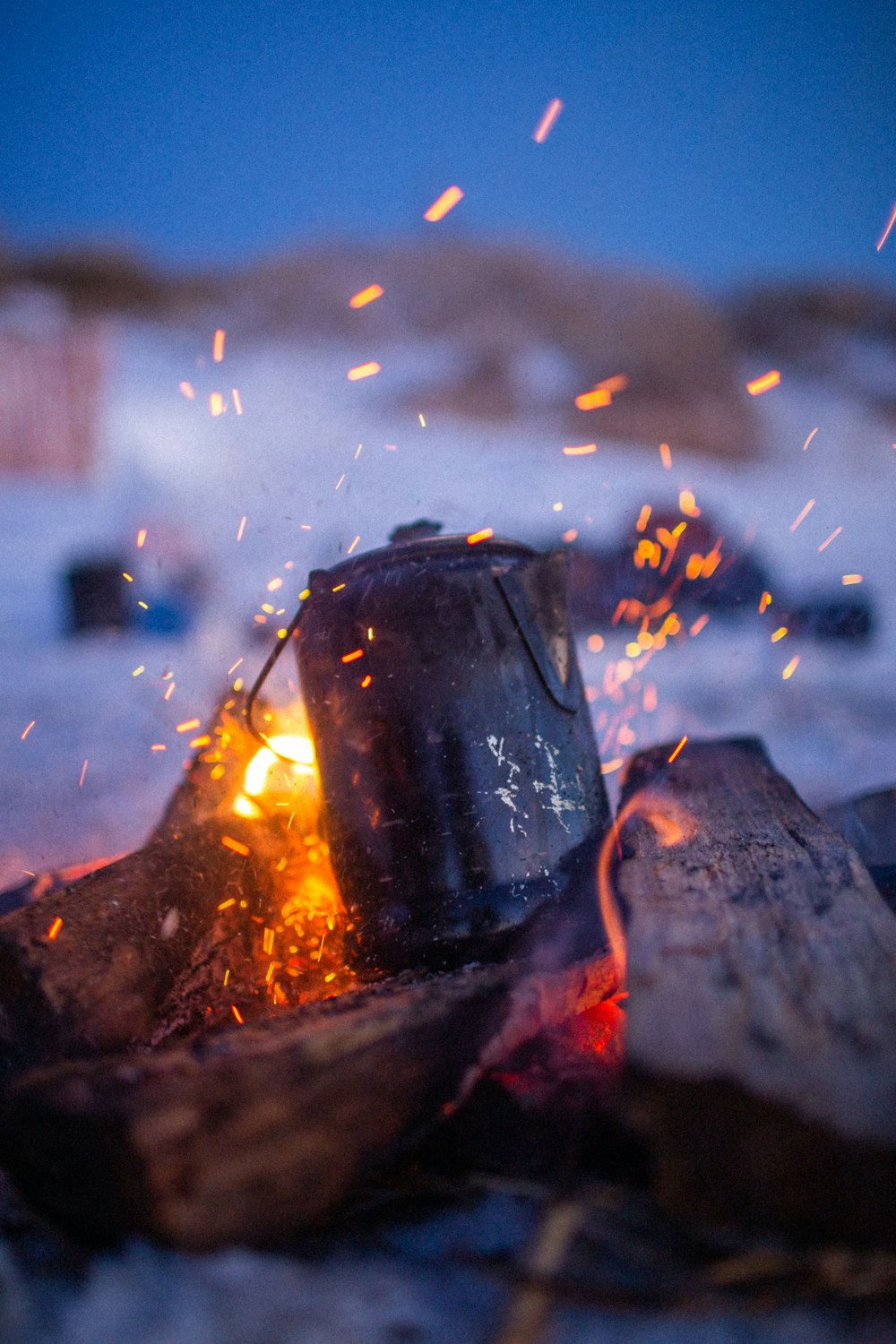 black steel kettle on fire