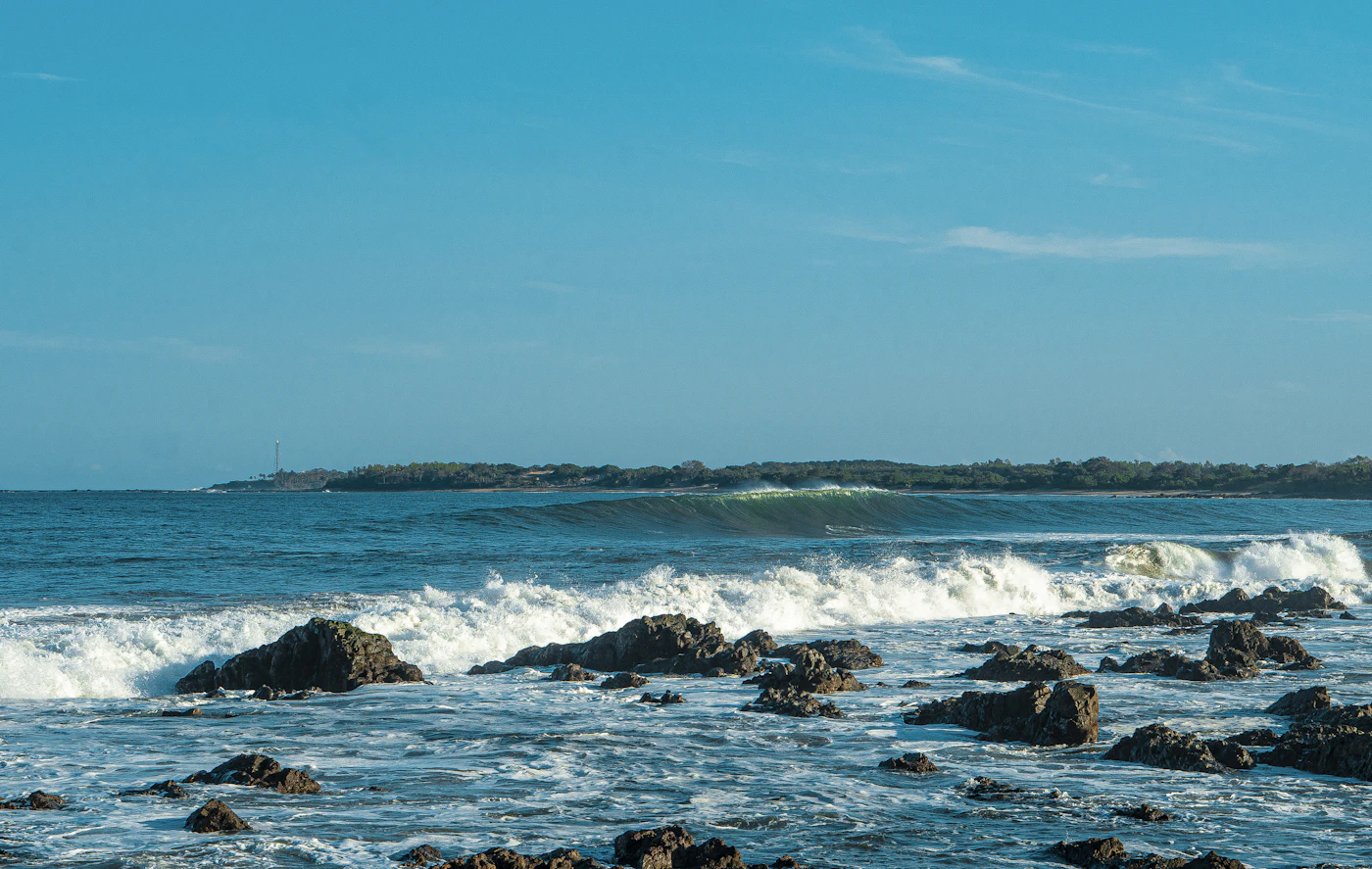 Ocean waves crashing on rocks on Panama's dry Pacific coast