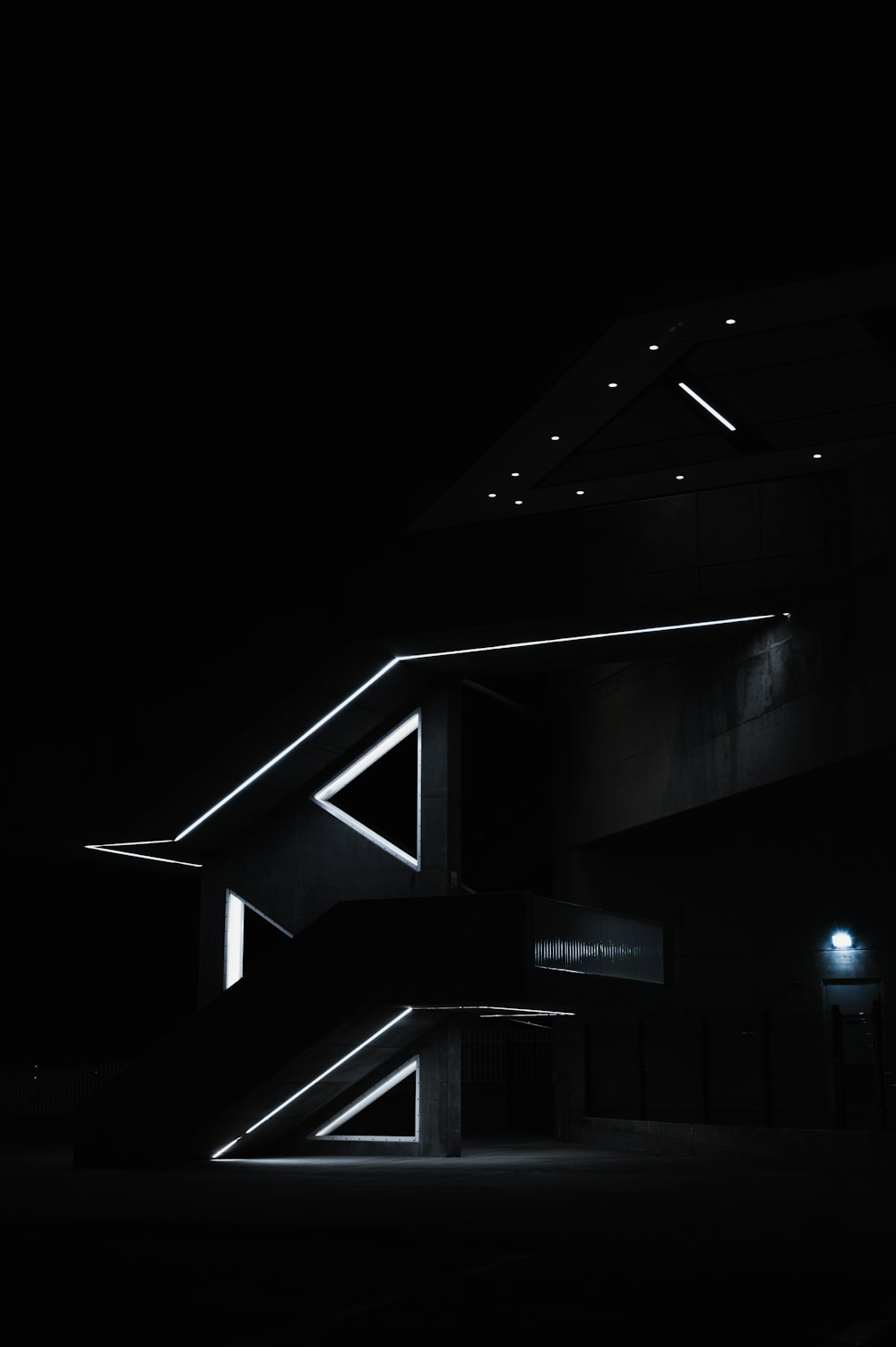 white and black building during night time