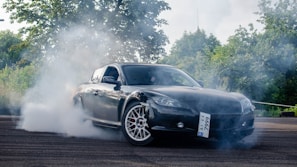black porsche 911 on road