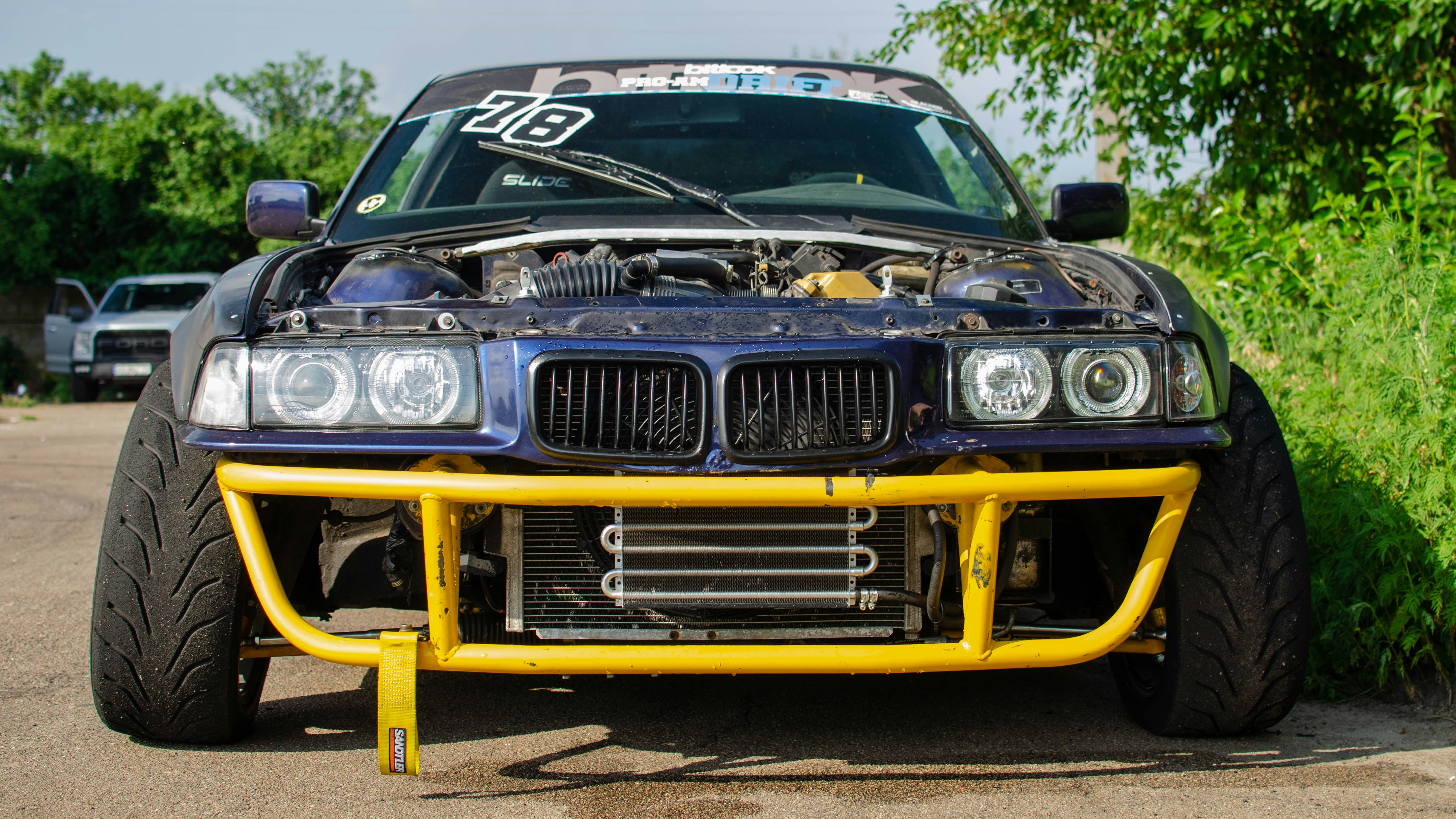 Purple And Yellow Chevrolet Camaro On Race Track Photo Free 35mm Image On Unsplash