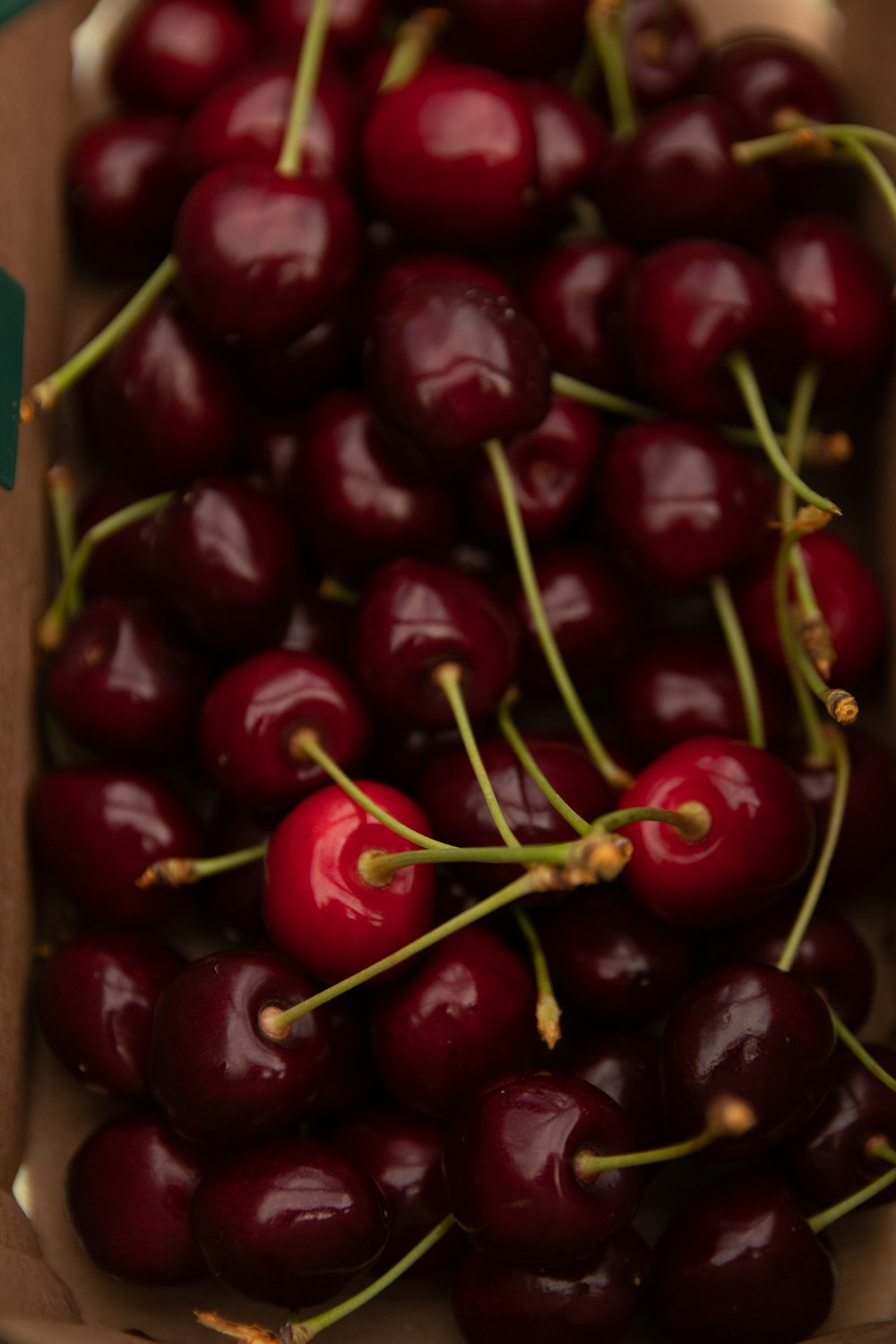 red cherries in white box