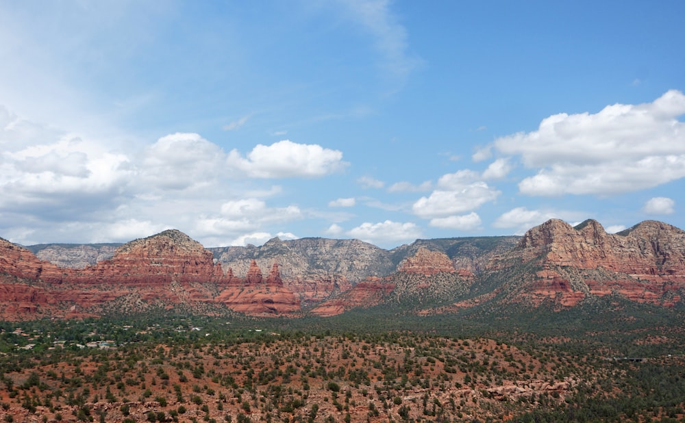 brown mountains under blue sky during daytime