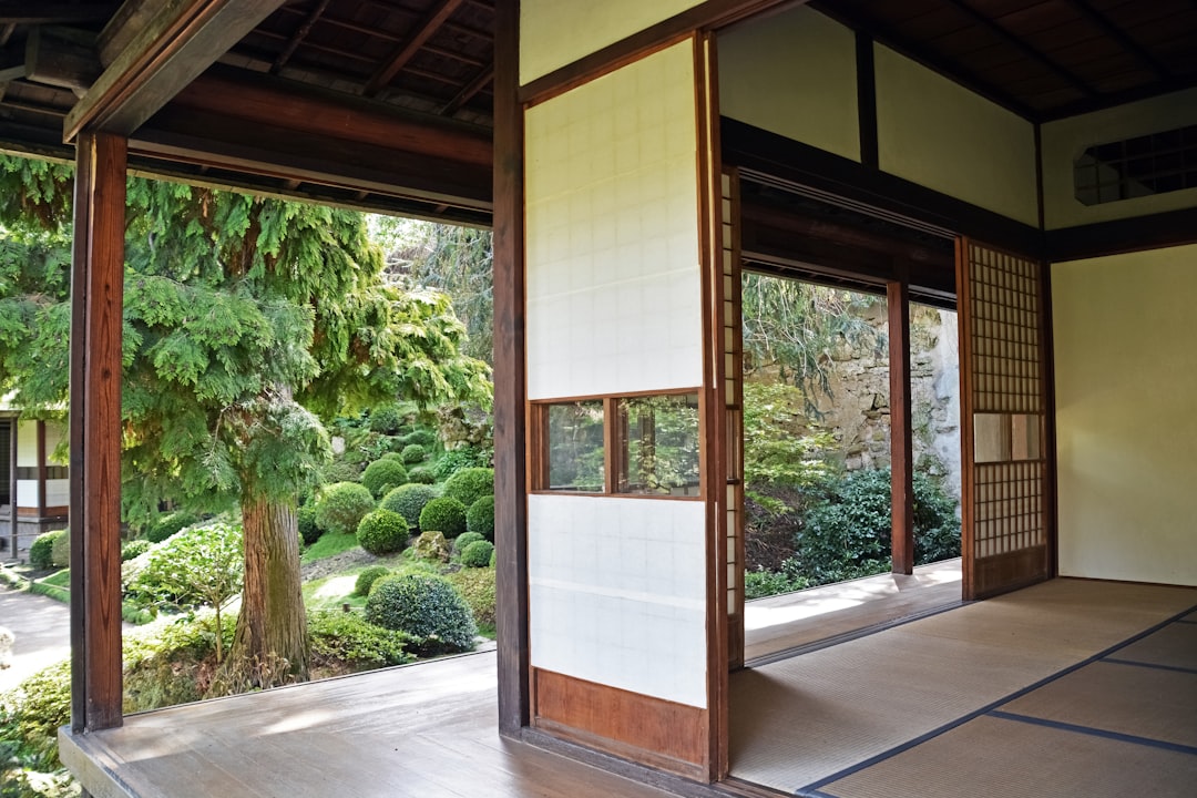 brown wooden framed glass door