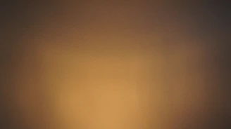 A serene home interior bathed in warm beige and brown tones reflecting natural energy balance.