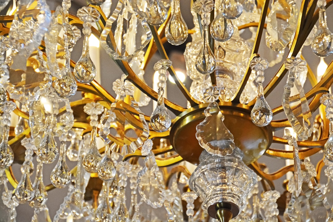 gold and silver uplight chandelier