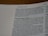A close-up view of an open page from a book, specifically from the Bible, displaying text in English. The visible section includes passages from 2 Kings 15:6, discussing kings Jotham and Zechariah. The text is printed in a serif font, with chapter numbers and headings in bold.