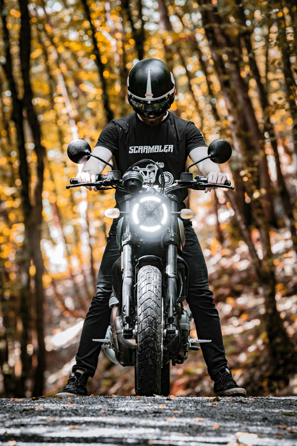 man in black helmet riding motorcycle