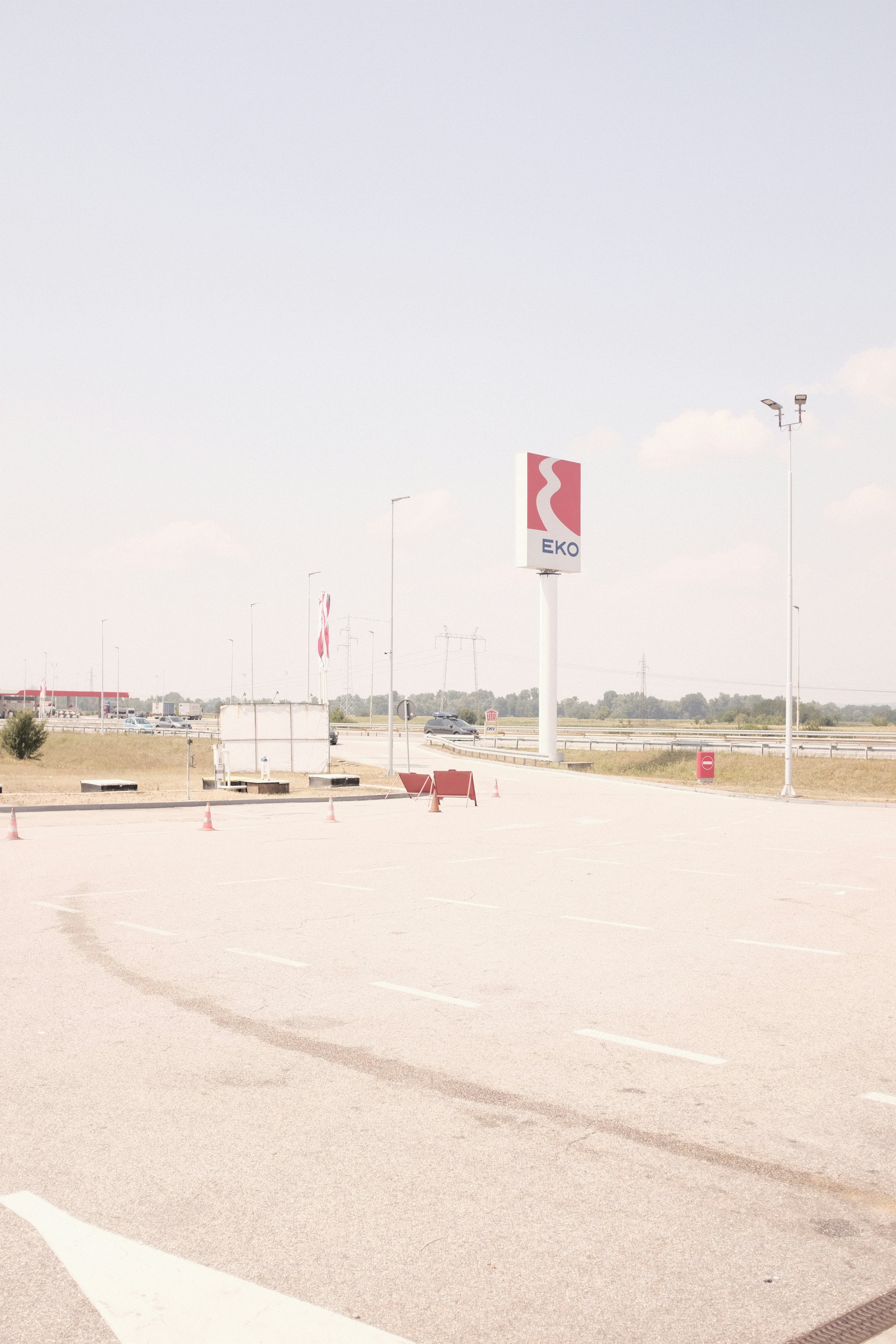 white and red road sign