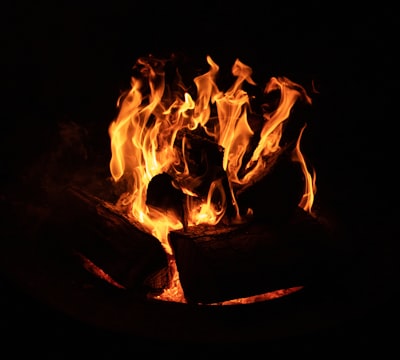 fire in black round container