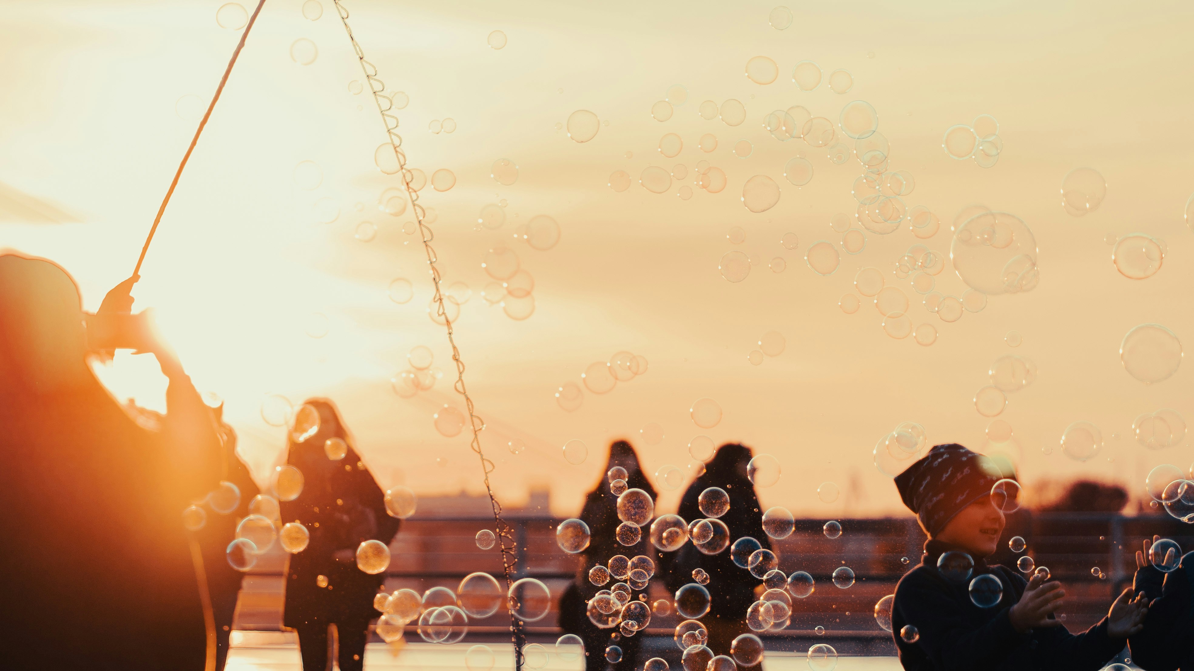 water droplets on glass during sunset