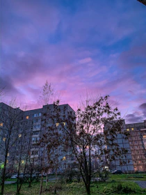 Ultra-realistic image of a luxurious residential development at sunset.