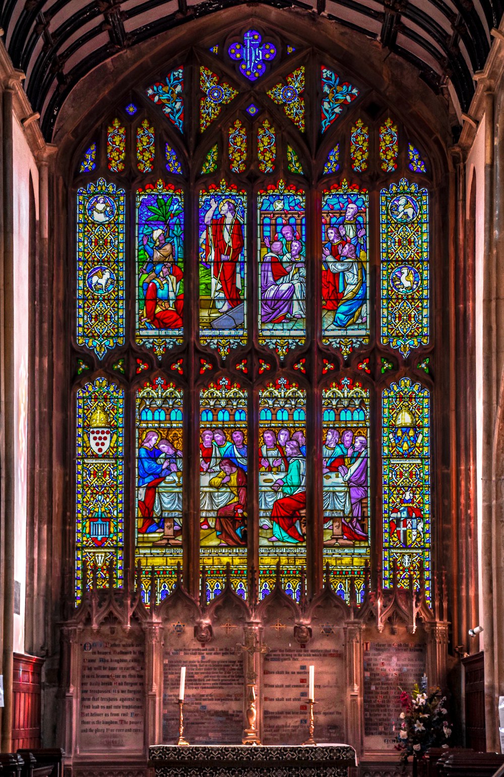 blue red and green floral glass window