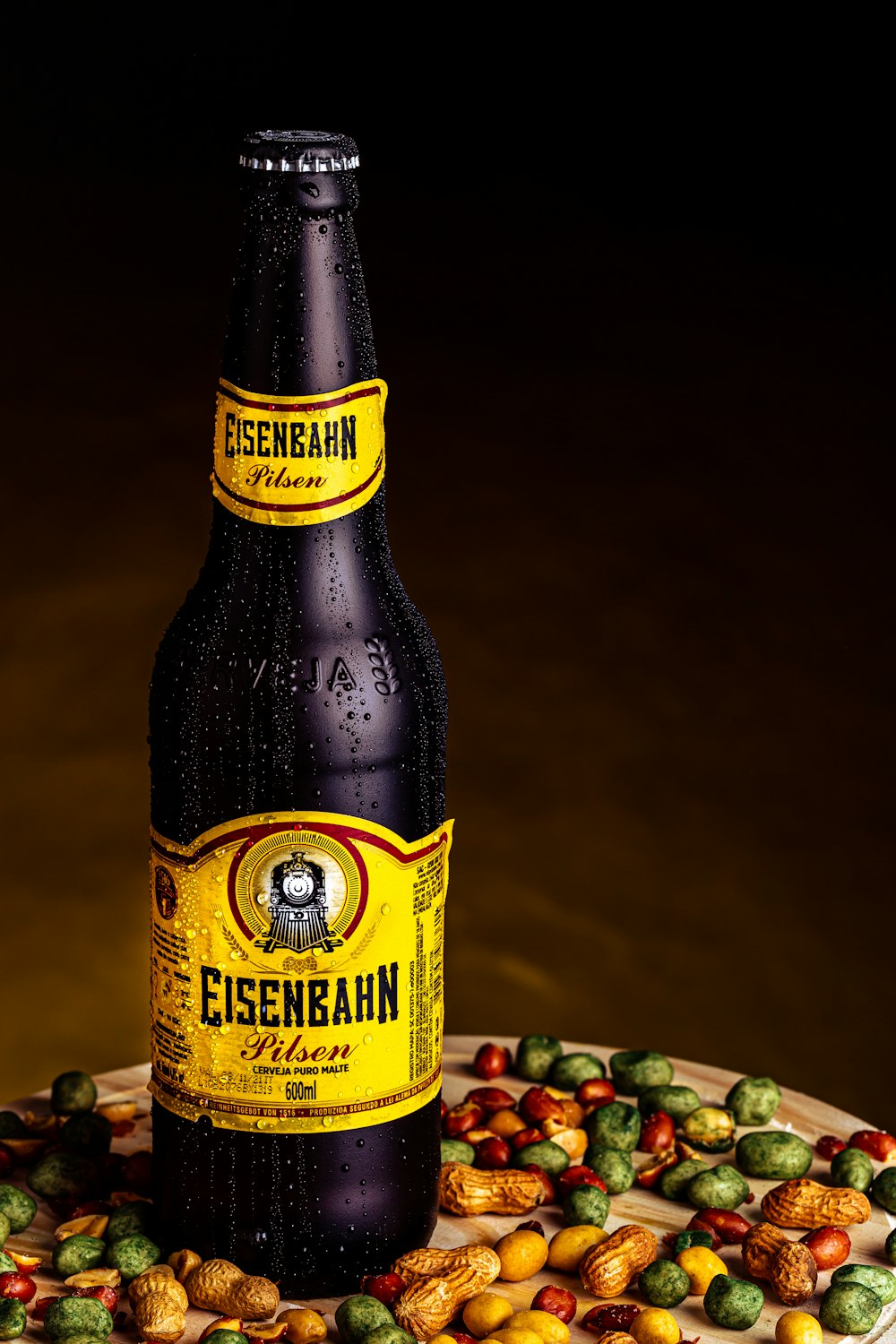 yellow labeled bottle on brown wooden table