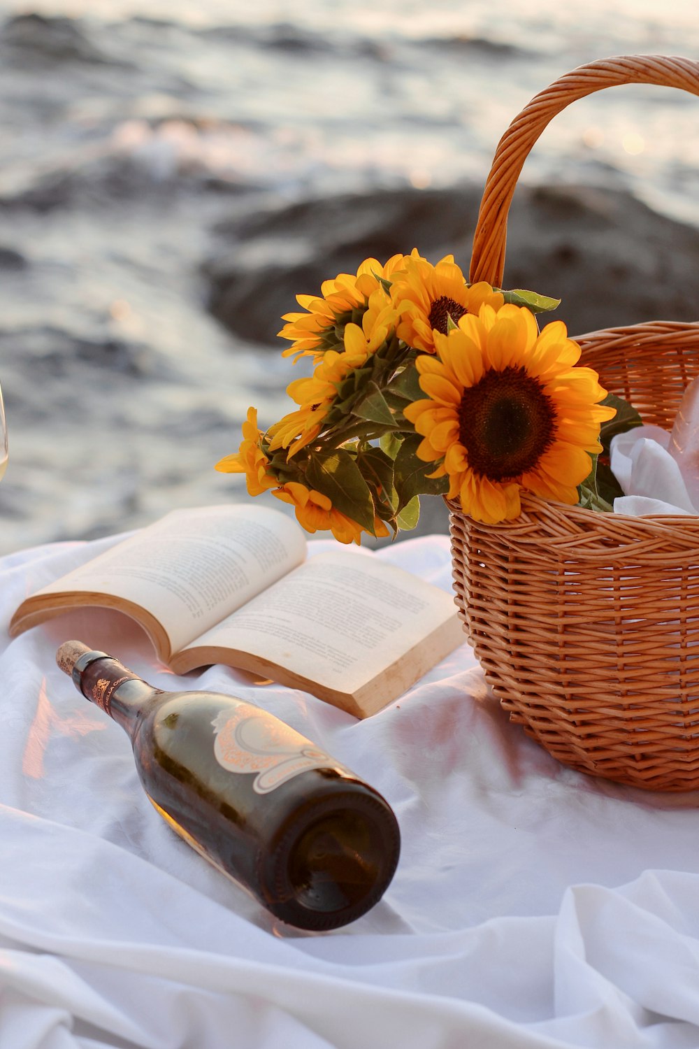 yellow sunflower in brown woven basket