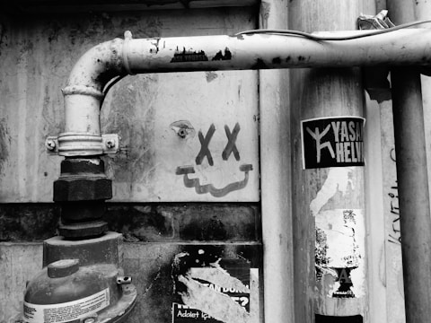 grayscale photo of bicycle lane sign
