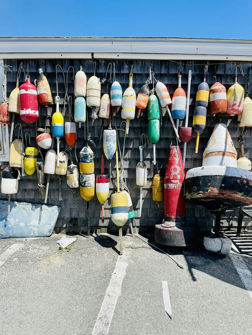 red yellow and green glass bottles on black metal rack