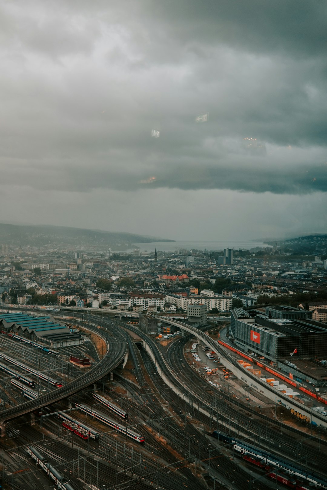 city buildings under gray cloudy sky during daytime