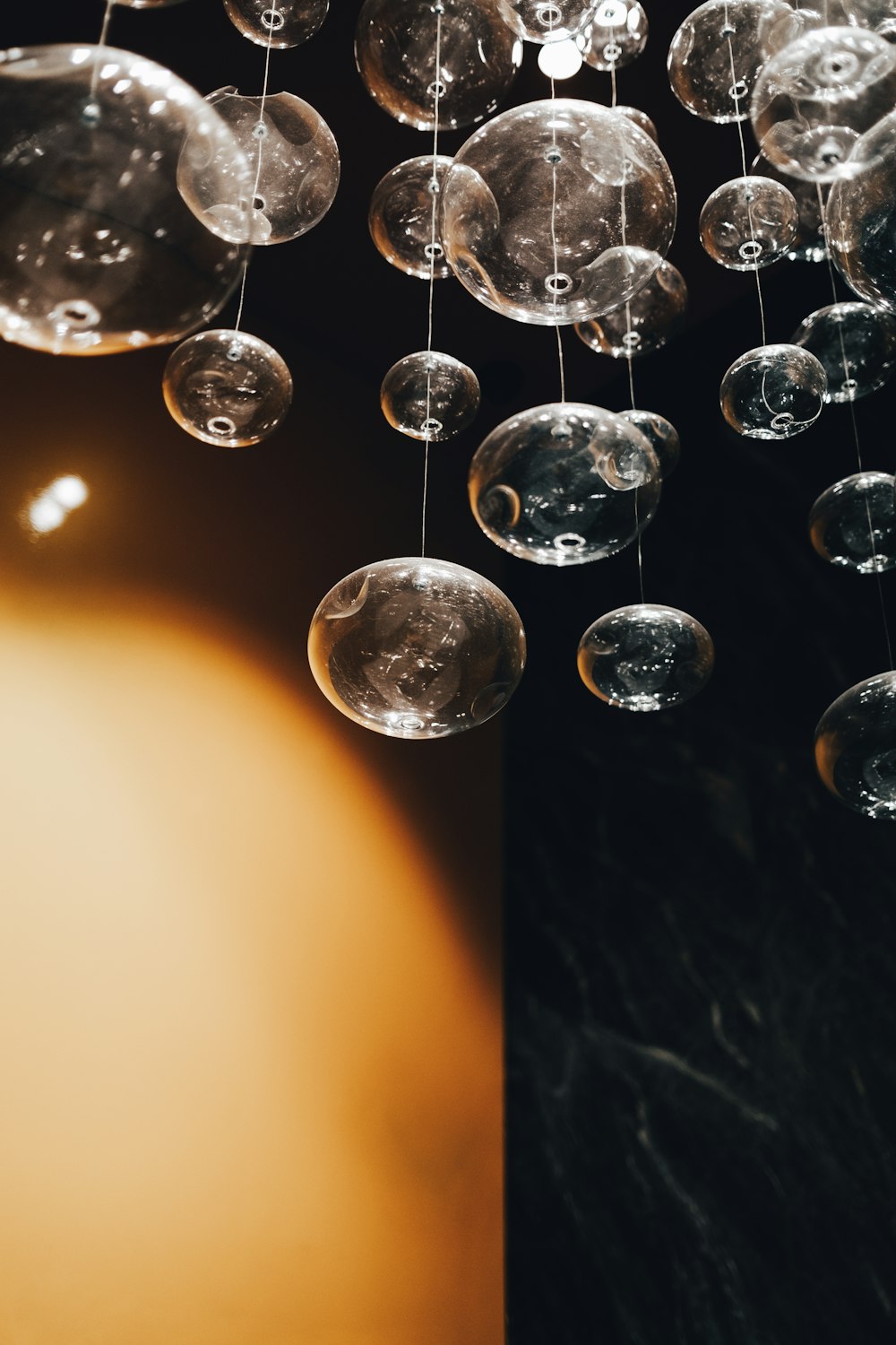 clear glass ball on black table