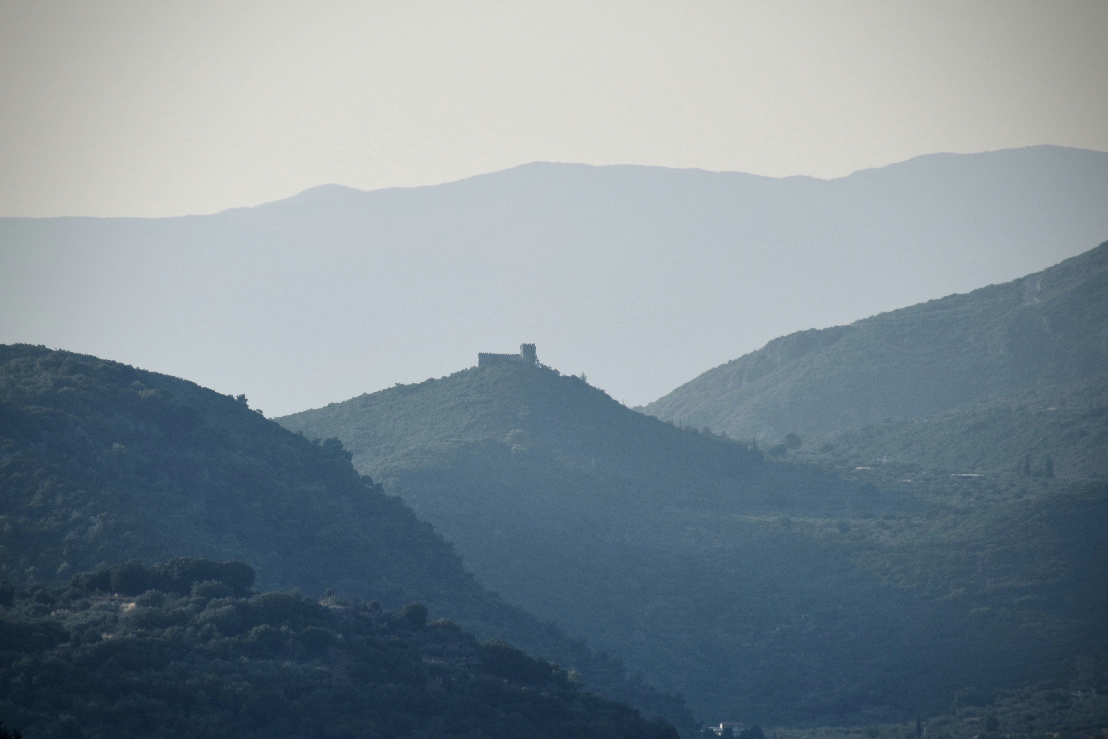 Old Osman castle of „Kapetanakis Tower“ betwenn Kardamyli and Kalamata on the „mani“ on Peloponnesos, Greece on a July evening, looking north. Built probably in 1795.