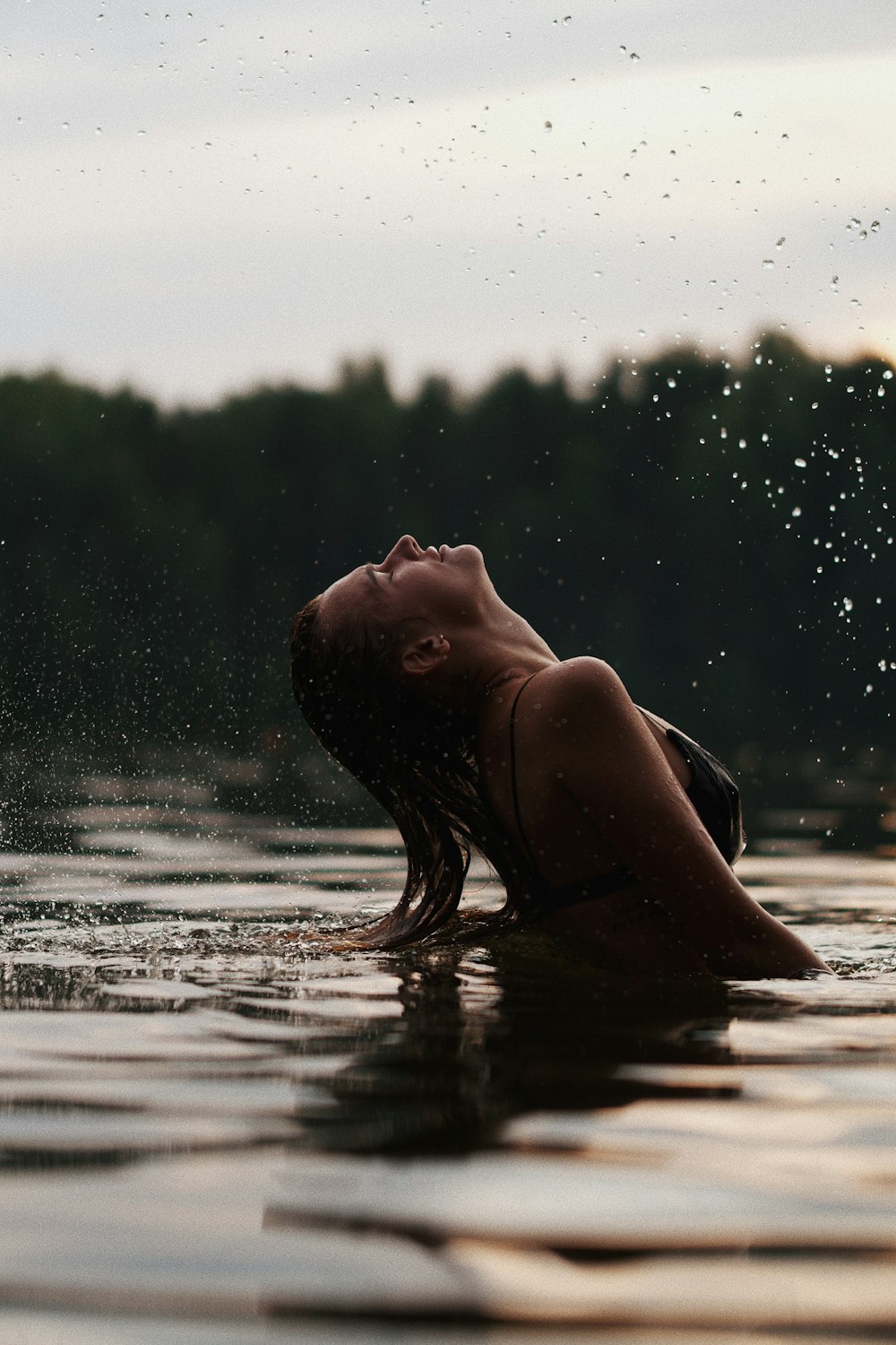 woman in water during daytime