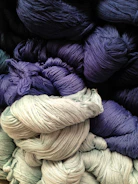 Close-up of vibrant wool skeins arranged artistically