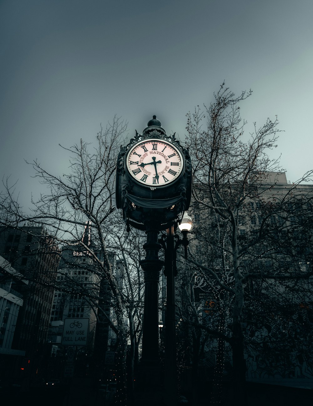 black and white analog clock