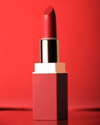 red lipstick on red surface