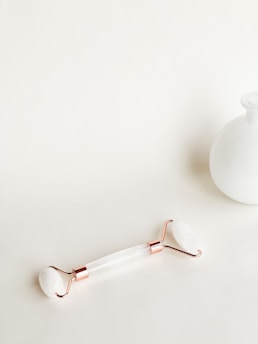 white ceramic vase with white liquid