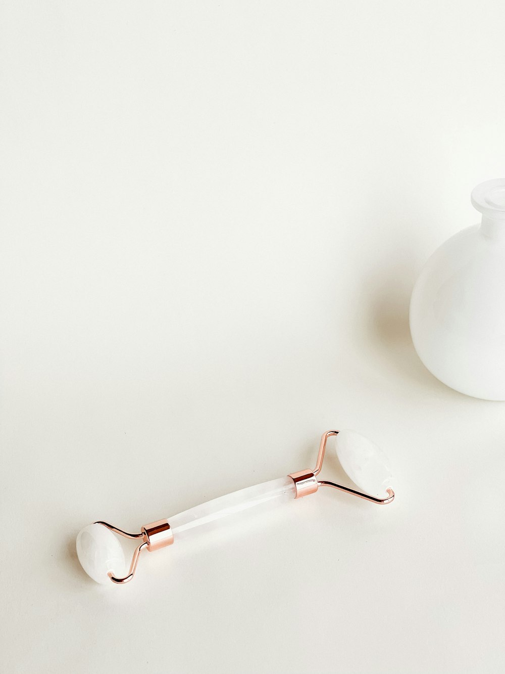 white ceramic vase with white liquid