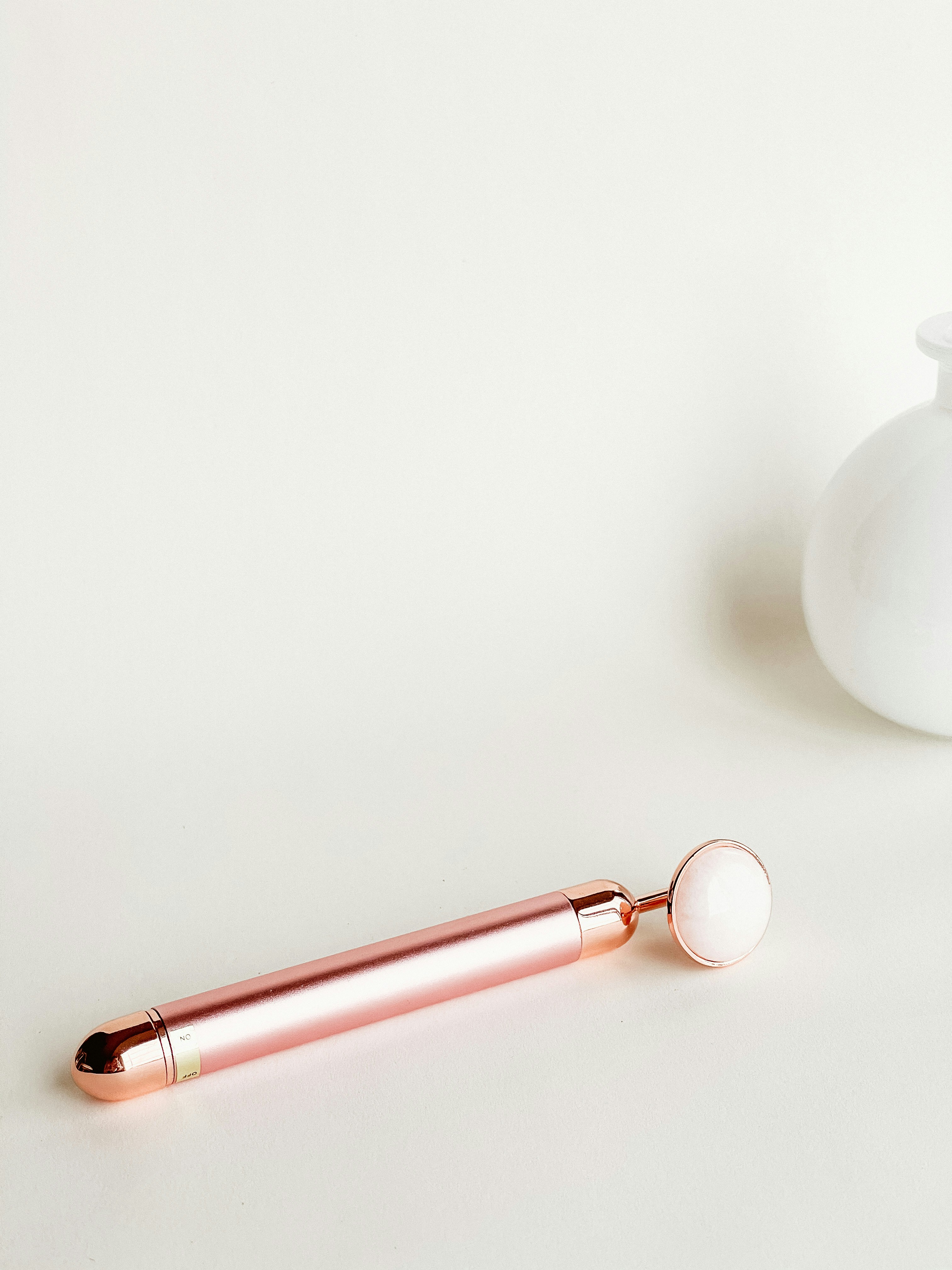 white ball with red pen