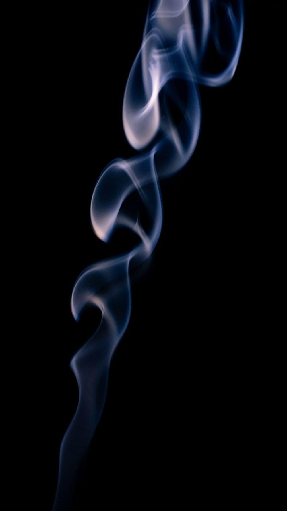 white smoke on black background