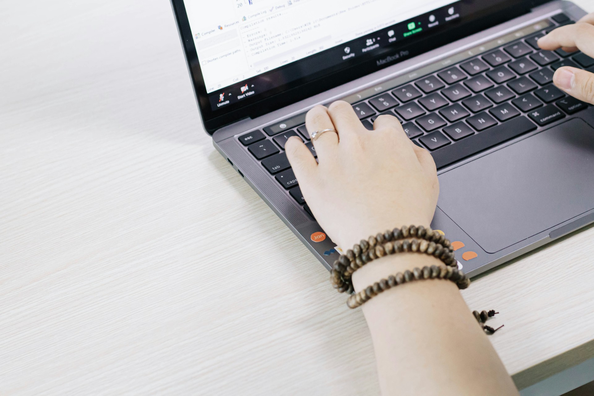 person using black and silver laptop computer