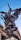 A dramatic bronze statue of a winged horse with a human figure riding it is prominently displayed against a clear blue sky. The sculpture is detailed and dynamic, capturing a sense of movement and mythology.
