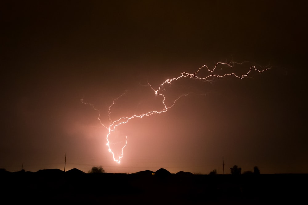 a lightning bolt striking across a dark sky