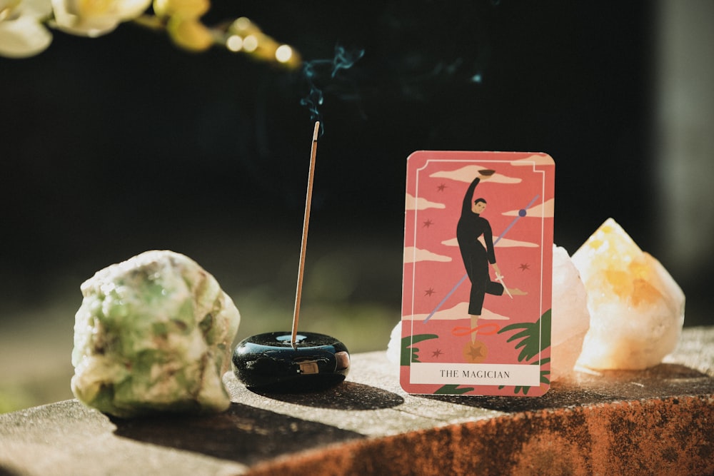 Incense, crystals, and a tarot card